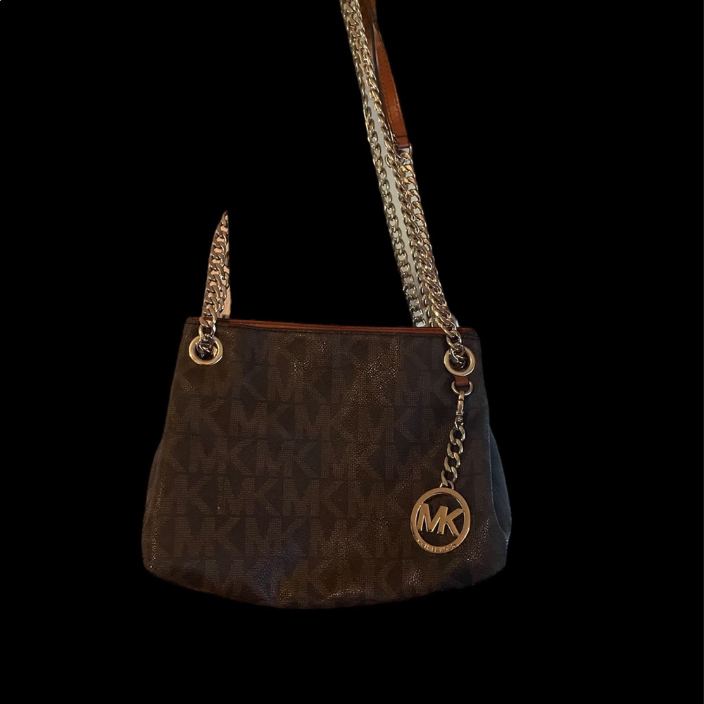 Michael kors purse with gold chain for handle goes small and long authentic